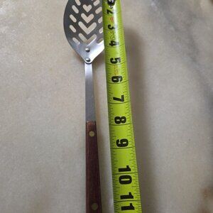 Slotted serving spoon stainless steel wood handle 12 inches long Made In Taiwan